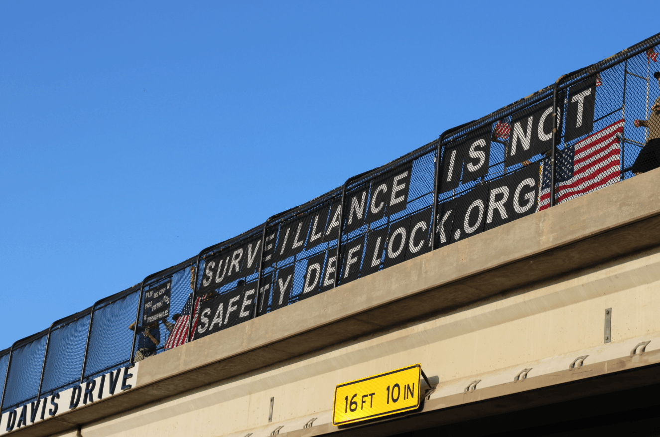 DFW Activists Use Highway Bridges as Platforms for Political Messaging